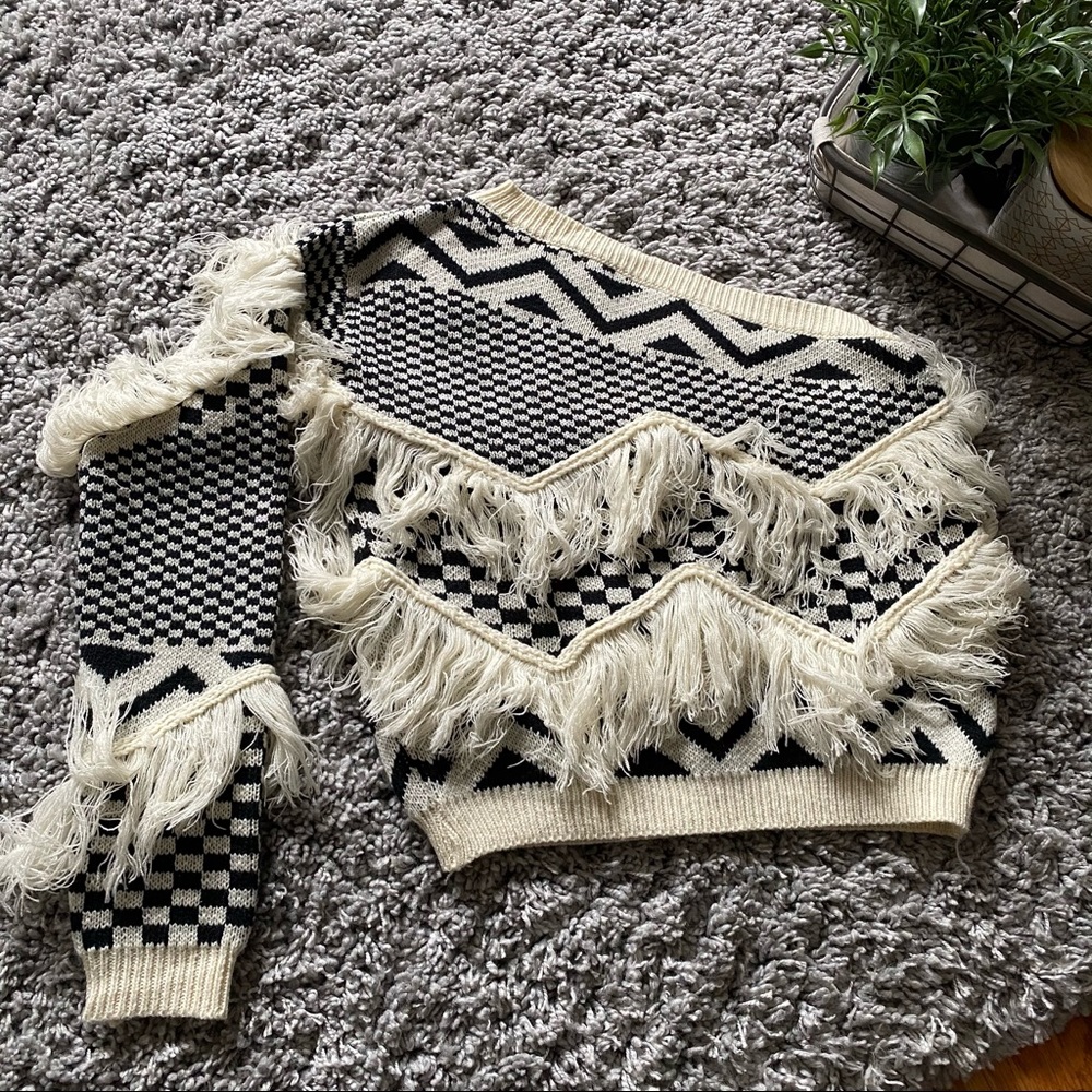One shoulder fringe sweater size medium.
